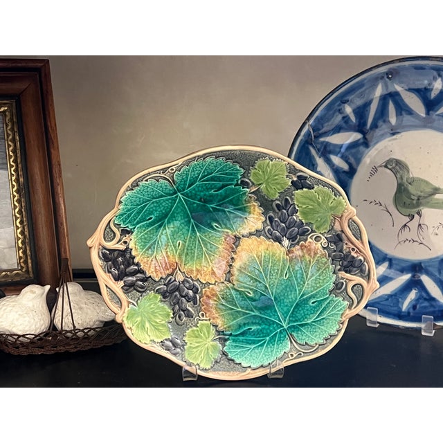 Antique majolica bread plate made in England by Wedgwood in the late 19th century. The plate is unmarked.