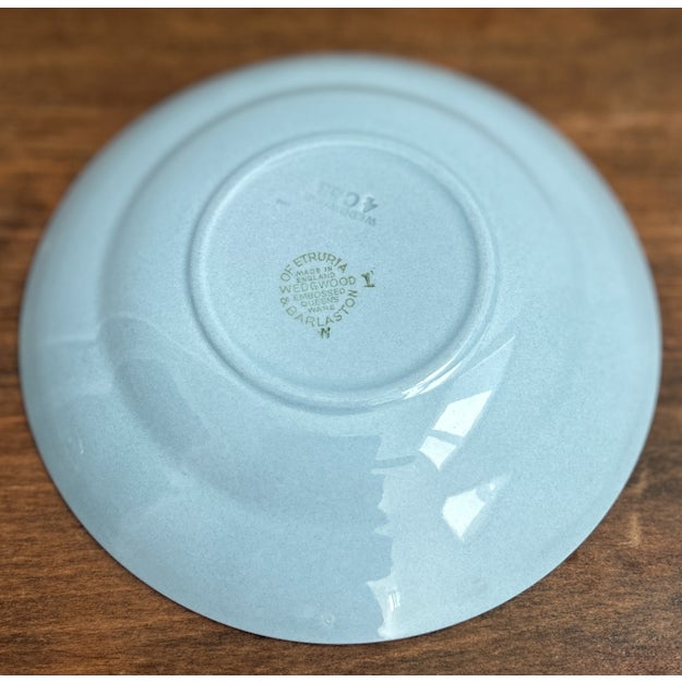 Wedgwood Embossed Queen's Ware Replacement teacup saucer "Cream on Lavender". It features a glossy powder-blue glazed base...