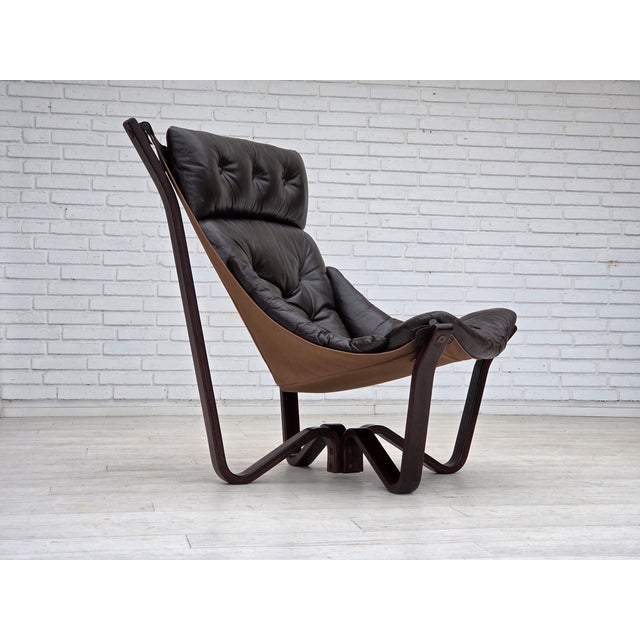 1970s, Norwegian design by Jim Myrstad for Brunstad Møbelfabrik, loungechair, model "Viking". Original brown furniture...