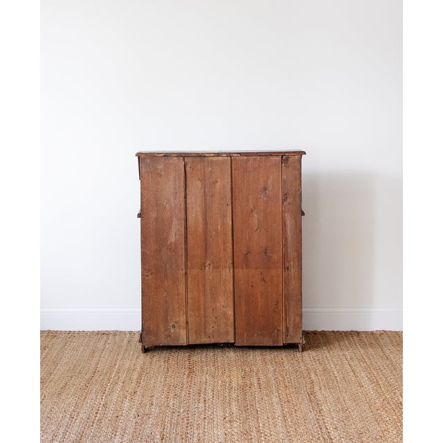 Width: 38 inches Height: 46 inches Depth: 16 inches A wonderfully characterful 19th-century Continental slant-front...