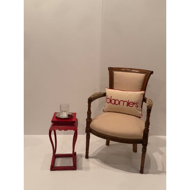 A great pop of color in this Chinese square end table having scalloped apron and black finish running through the wood.