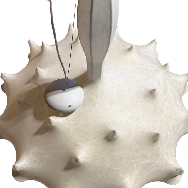 Authentic Flos Zeppelin Cocoon Chandelier designed by Marcel Wanders, an iconic contemporary lighting piece celebrated for...