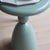 The side table is a newly produced piece of furniture made of lacquered metal with a rotationally symmetrical structure...