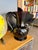 This hand-blown black amethyst glass water pitcher was crafted in 2005 by master glassblower Garrett Vilicich for Liberty...