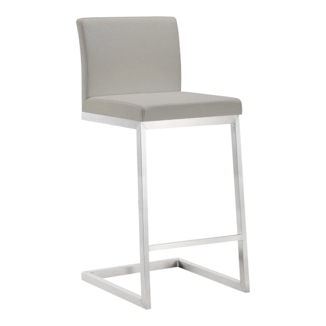 Furnish your kitchen or bar area in contemporary style with the Parma counter stool from TOV. The solid stainless steel...