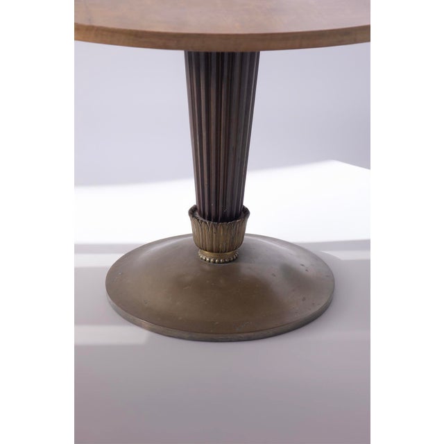 Step into a world of Italian mid-century elegance with this exquisite dining table, attributed to the master craftsman...