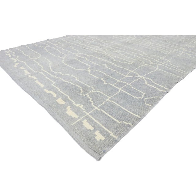 Contemporary gray Moroccan style rug with modern linear design. This hand knotted wool contemporary Moroccan area rug...