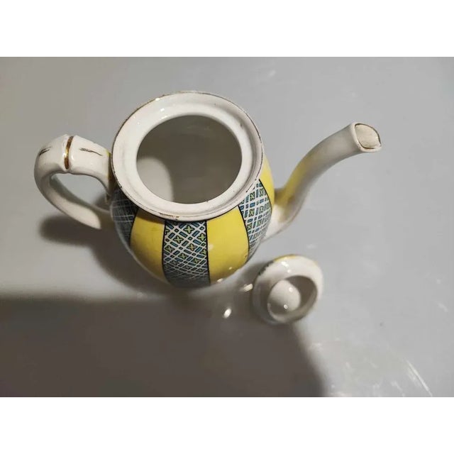 MZ Altrohlau jug, dimensions: height 18 cm, diameter at the bottom 6 cm, width with handle 17 cm.