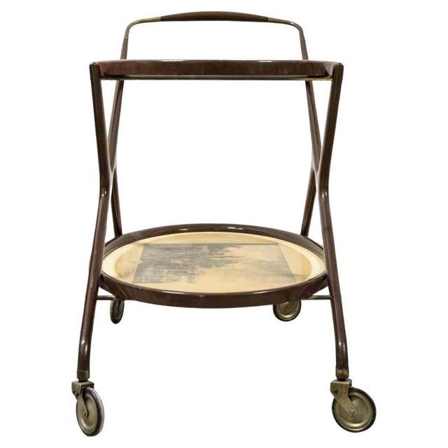 Vintage Cart is an original design item attributed to the Italian designer Cesare Lacca in the 1950s. A wooden brass bar...