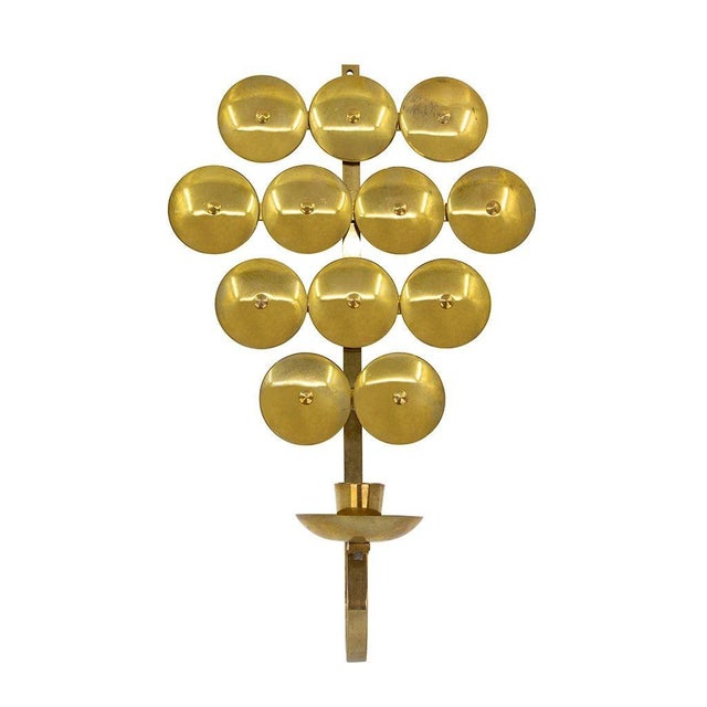 Pair of Swedish mirrored brass one arm candle sconces. Sweden, 1960's.