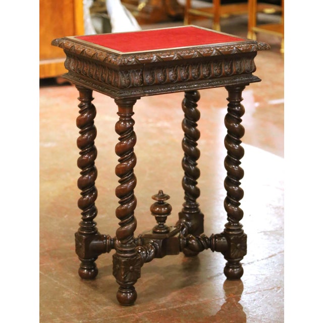 Bring timeless French elegance to a study, library, or living room with this handsome antique side table. Crafted in...