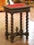 Bring timeless French elegance to a study, library, or living room with this handsome antique side table. Crafted in...