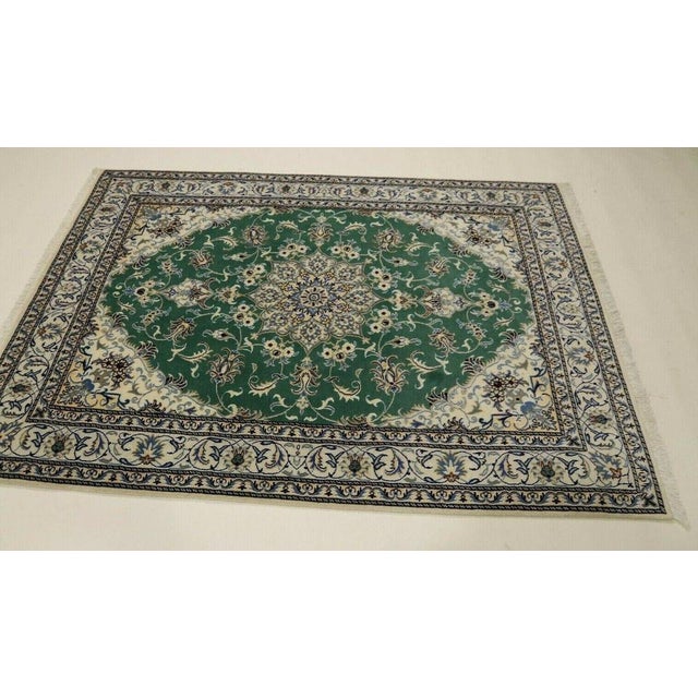 rug Super Nain | Size: 237 x 168 cm | Knot density: approx. 300.000 knots/m² | Material: 90% new wool, 10% silk |...
