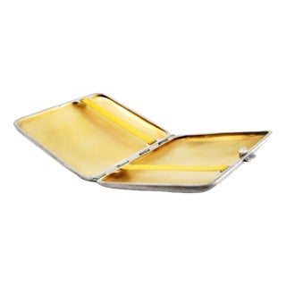 Silver Cigarette Case with High Relief on the Lid and Gold Interior. For Sale