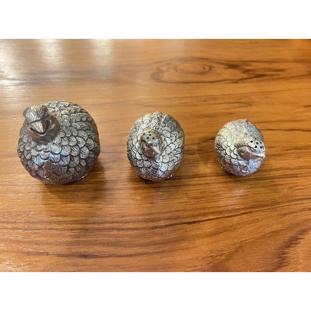 Vintage gucci salt - coarse salt and pepper shakers in the shape of three silver-plated pewter quails with the inscription...