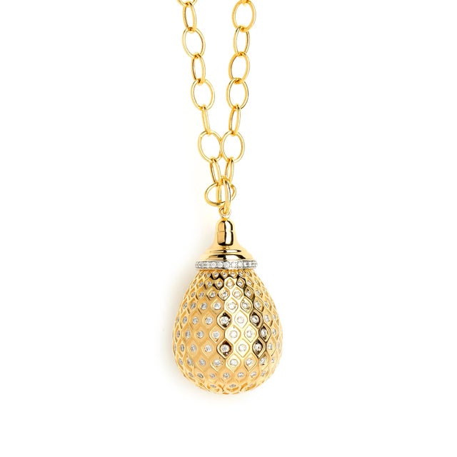 Created in 18 karat yellow gold Diamonds 1.65 cts approx Limited edition Chain sold separately Envisioned in luxurious 18...