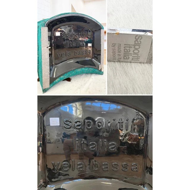 A stunning and exceptionally comfortable armchair and ottoman set with a gorgeous original golden piero fornasetti...