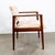 Danish armchair in rosewood in the style of Finn Juhl. Abstract fabric throughout with some minimal wear. Overall very...