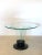 Small table designed in the style of Pietro Chiesa for Fontana Arte in the 1950s, black lacquered wood base in which 4...