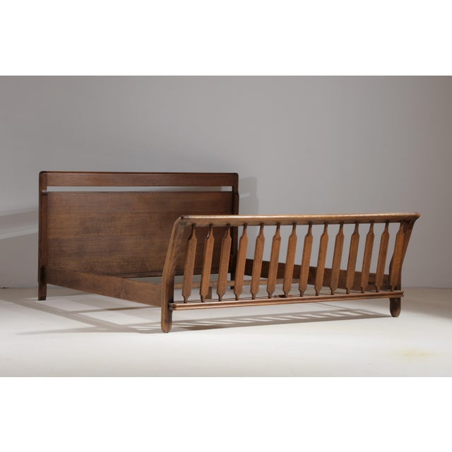 This solid oak double bed was designed by the french design duo guillerme and chambron and produced by votre maison in the...