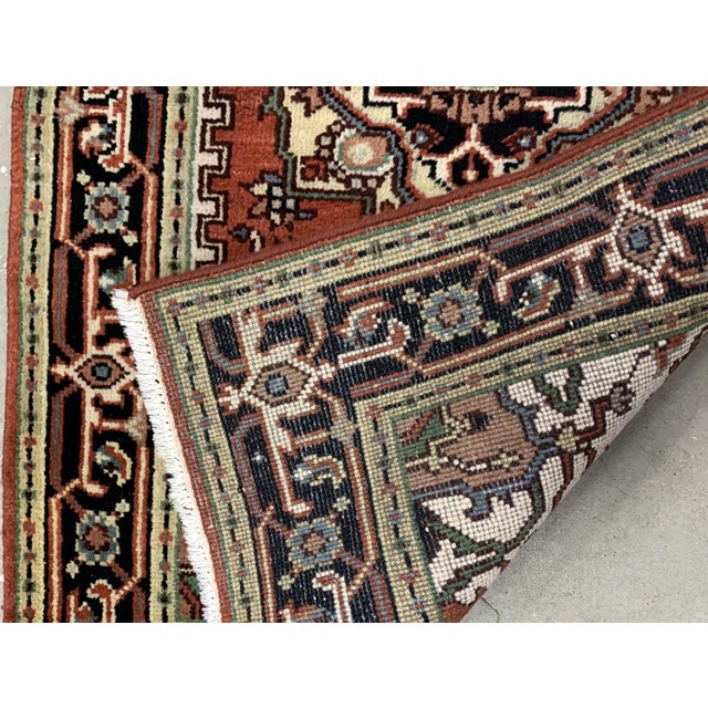 Handmade vintage Middle Eastern rug in traditional design and natural dyes. The rug is from the end of 20th century in...