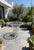 Metal Vintage Mid Century Modern Restored White Glass Patio Wrought Iron Dining Table Attributed to Arthur Umanoff for Shaver Howard For Sale - Image 7 of 7