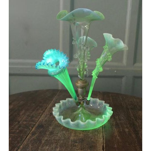 French Hand Blown Uranium Glass 3 Trumpet Epergne This beautiful Epergne has 3 different hand blown decorated trumpets set...