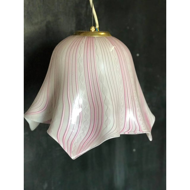 Murano pendant lighting from the 60s with unusual shape and adjustable height.