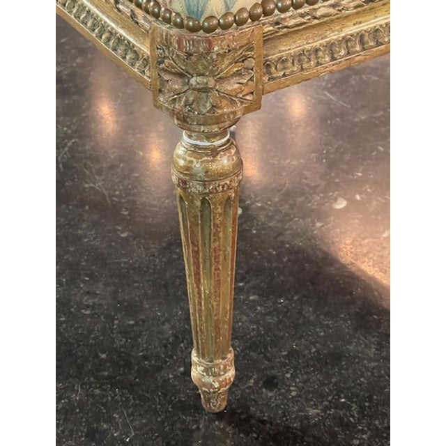 The 19th c. French Louis XVI Giltwood Ottoman is a luxurious and elegant piece of furniture that exudes timeless charm....