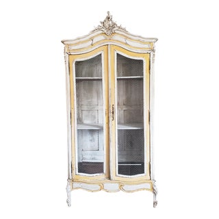 Late 19th Century Distressed French Carved Armoire For Sale