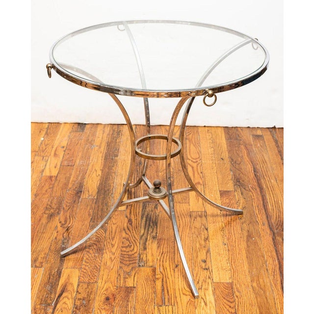 Maison Jansen Style Chromed Metal Gueridon, with circular glass top, apparently unmarked. 26.5" H x 27" Diameter....
