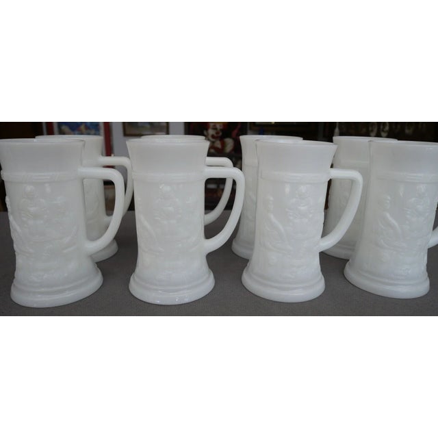 Up for sale is a Set of 8 Vintage 1960's American Federal Milk Glass Bavarian Tavern Scene Motif Steins! They each measure...