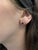 These round 4mm Solitaire studs feature natural rhodolite garnets from Madagascar (1.22 carat total), set in solid 14K...