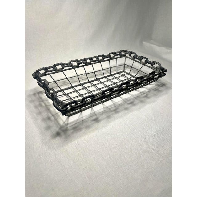The brutalist/industrial style chain link rim of this basket makes it truly one of a kind! It's a nice moderate size and...