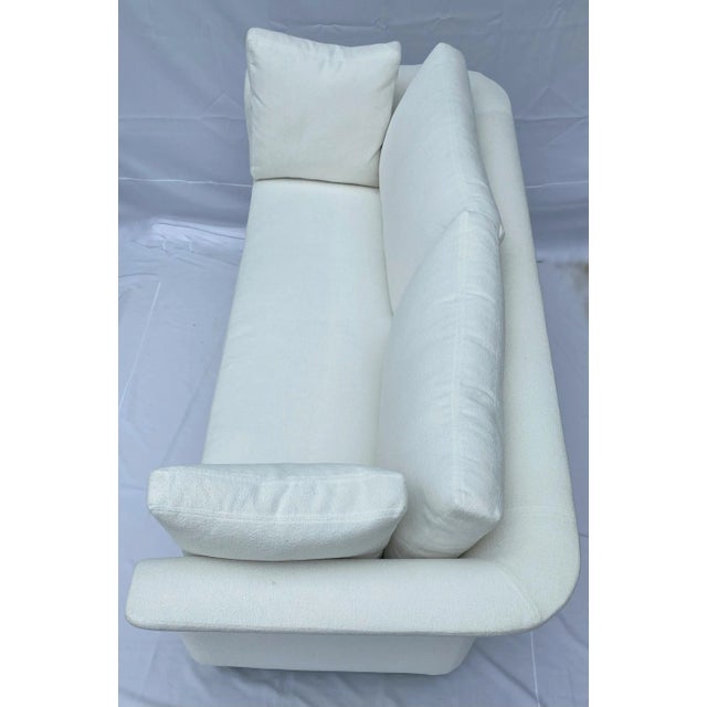 Sophisticated white flared arm sofa. Fully reupholstered in this gorgeous white nubby fabric. This unique design makes...