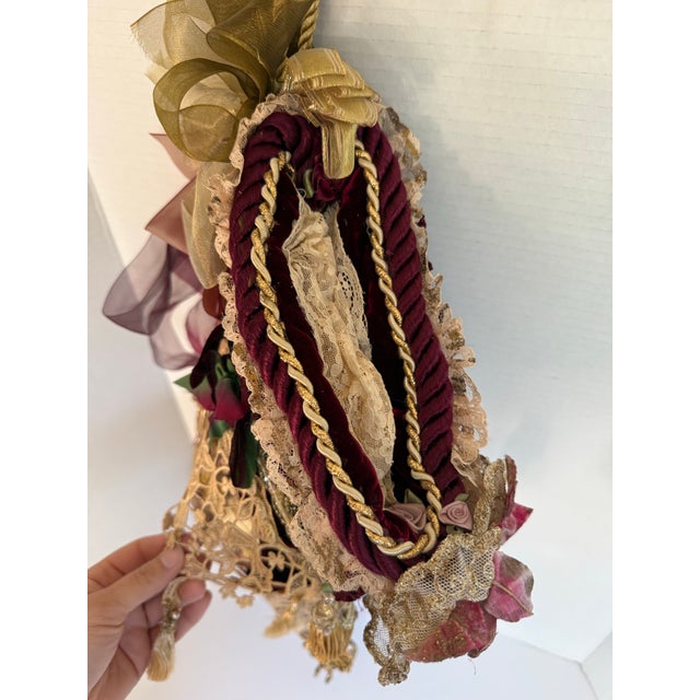 Here is a beautifully handcrafted Victorian-style Christmas stocking dating to the later part of the 20th century. Richly...