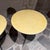 For your consideration a pair of side tables with sculptural tripod base and round goatskin top in tan color. Custom made....
