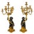 A VERY FINE PAIR OPPOSING PUTTO FIGURALS RAISING CORNUCOPIA WITH SEVEN-LIGHT CANDELABRA Paris, circa 1880 Gilded bronze,...