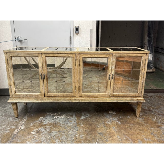 Design Plus Gallery presents the DeVera Mirrored Console from the Mélange Collection by Hooker Furniture. Crafted from...
