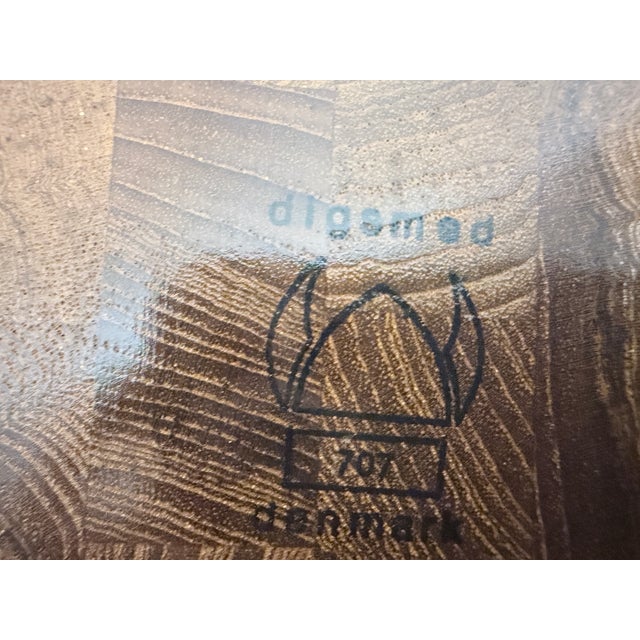 One Danish turntable from the 1960s by Digsmed Teak wood. Good used condition. Minor wear. 5 x 41 cm This piece has an...