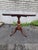 Originating from the 1820s, this table is a prime example of the Federal style, characterized by its graceful lines and...