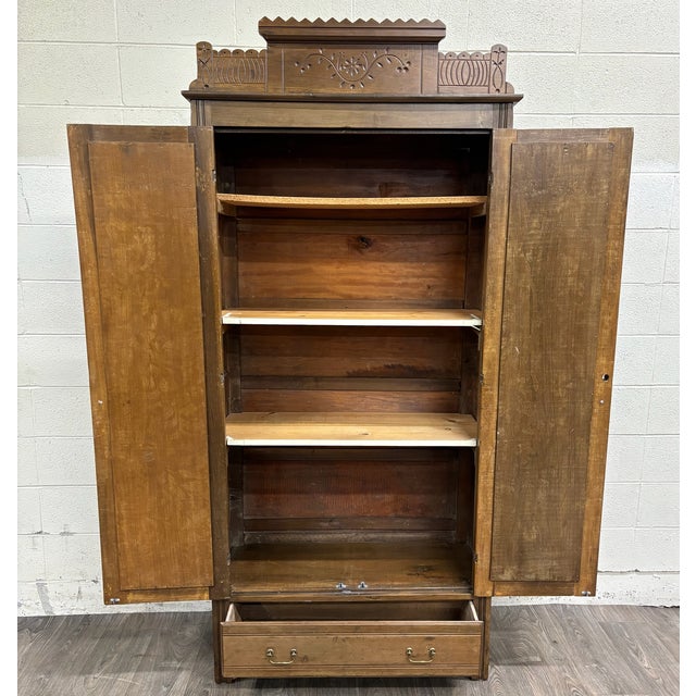 This is a stunning antique Victorian Eastlake Aesthetic Movement wardrobe, armoire, or hall cupboard, dating to the late...