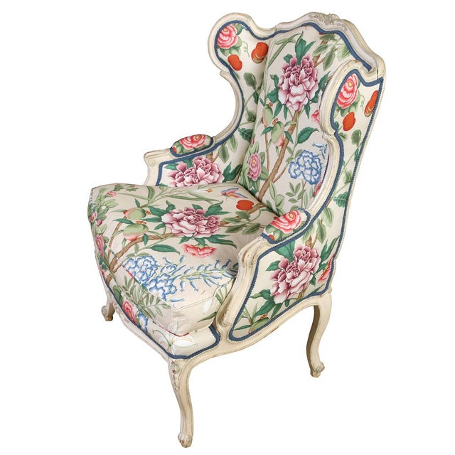 This wingback chair is a true statement piece, newly reupholstered in a gorgeous floral from Cowtan & Tout and expertly...