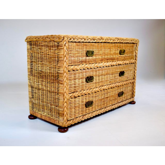 A fabulous old South Florida Coastal braided wicker chest of three drawers, with solid wood frame and substantially thick...