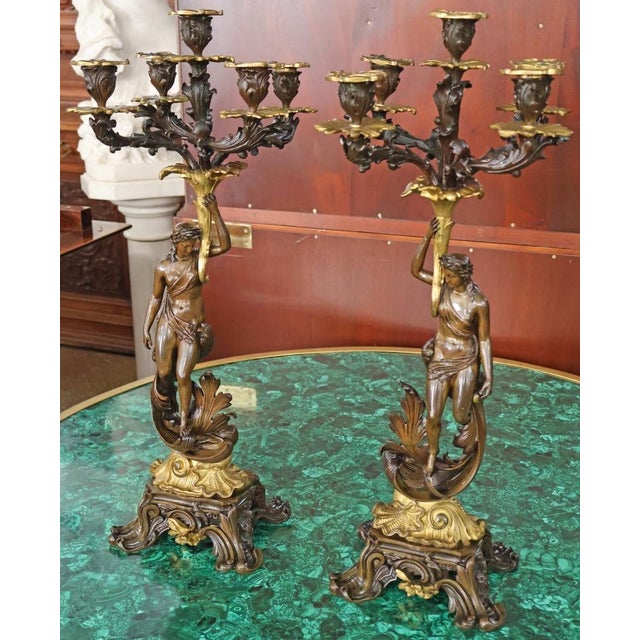Pair of 19th Century French Napoleon III Bronze Figural Candelabras Dimensions : 24" Tall X 12 X 12 A magnificent pair of...