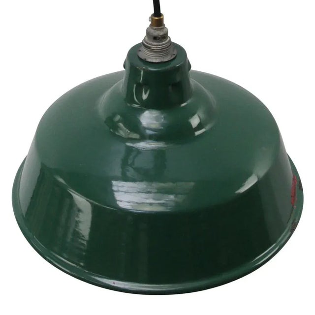 Industrial pendant by Simplex Electric Co. UK Green enamel shade with white interior. This piece has an attribution mark,...