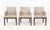 Set of Six Christian Liaigre Style Dining Armchairs, with taupe upholstery on wood legs. 33" H x 24.5" W x 25" D; seat:...