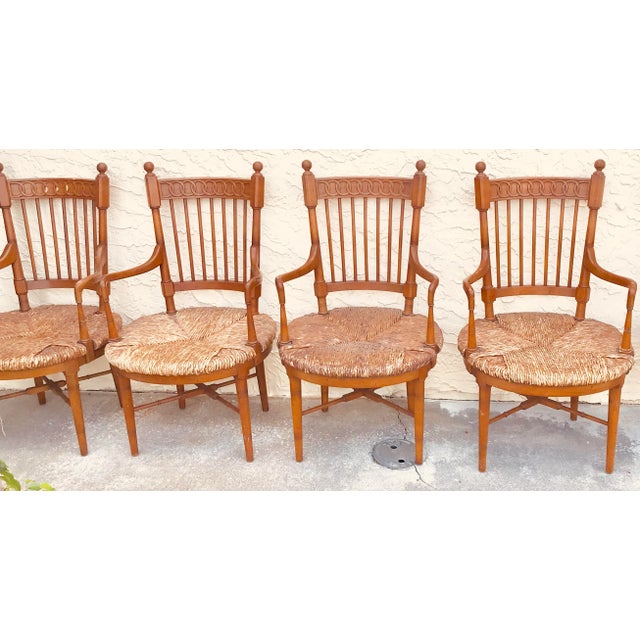 Stunning Mid Century set of 4 Dining Chairs by Tomlinson. Round rush seats. In good conditions, has few scratches