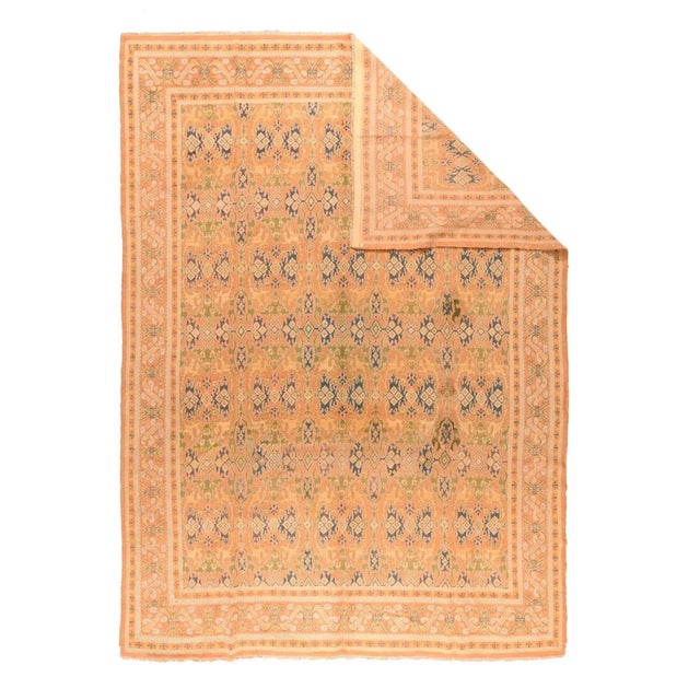 In the Renaissance style, and adapted from Lotto Oushaks, this European room size shows golden ochre field covered by an...