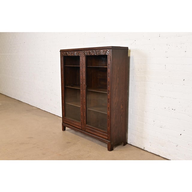 A gorgeous antique Victorian, Arts & Crafts, or Renaissance Revival bookcase In the manner of R.J. Horner & Co. USA, Circa...